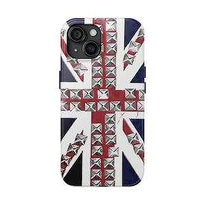 May include: A smartphone case featuring the Union Jack flag design. The case has a red, white, and blue color scheme with silver-colored stud accents. The case is designed to fit a smartphone.