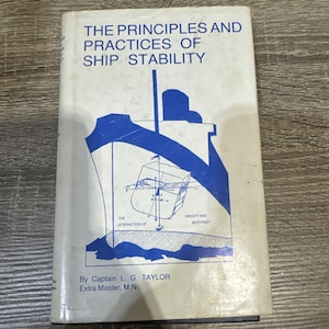 May include: A white hardcover book titled The Principles and Practices of Ship Stability by Captain L. G. Taylor, Extra Master, M.N. The cover features a blue graphic illustration of a ship hull with technical diagrams showing weight and buoyancy.