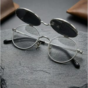 Okulary przeciwsłoneczne w stylu retro z odchylanymi do góry tytanowymi oprawkami | Okrągłe okulary przeciwsłoneczne w stylu steampunk | Okulary przeciwsłoneczne unisex vintage z soczewkami UV400