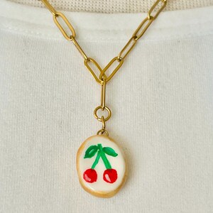Hand painted cherry clay ceramic pendant necklace, stainless steel paper lip chain