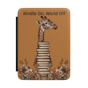 Könnte beinhalten: Ein Set aus drei Keramikbechern mit gesprenkelter, matter Oberfläche. Die Becher sind in Creme-, Hellgrau- und Dunkelgrautönen gehalten. Jeder Becher hat ein schlichtes, minimalistisches Design.