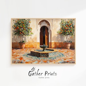 May include: A framed print of a courtyard scene with a fountain and orange trees. The artwork features a central fountain with a turquoise and gold mosaic design, flanked by potted orange trees. The print has a warm color palette with the text "Gather Prints".
