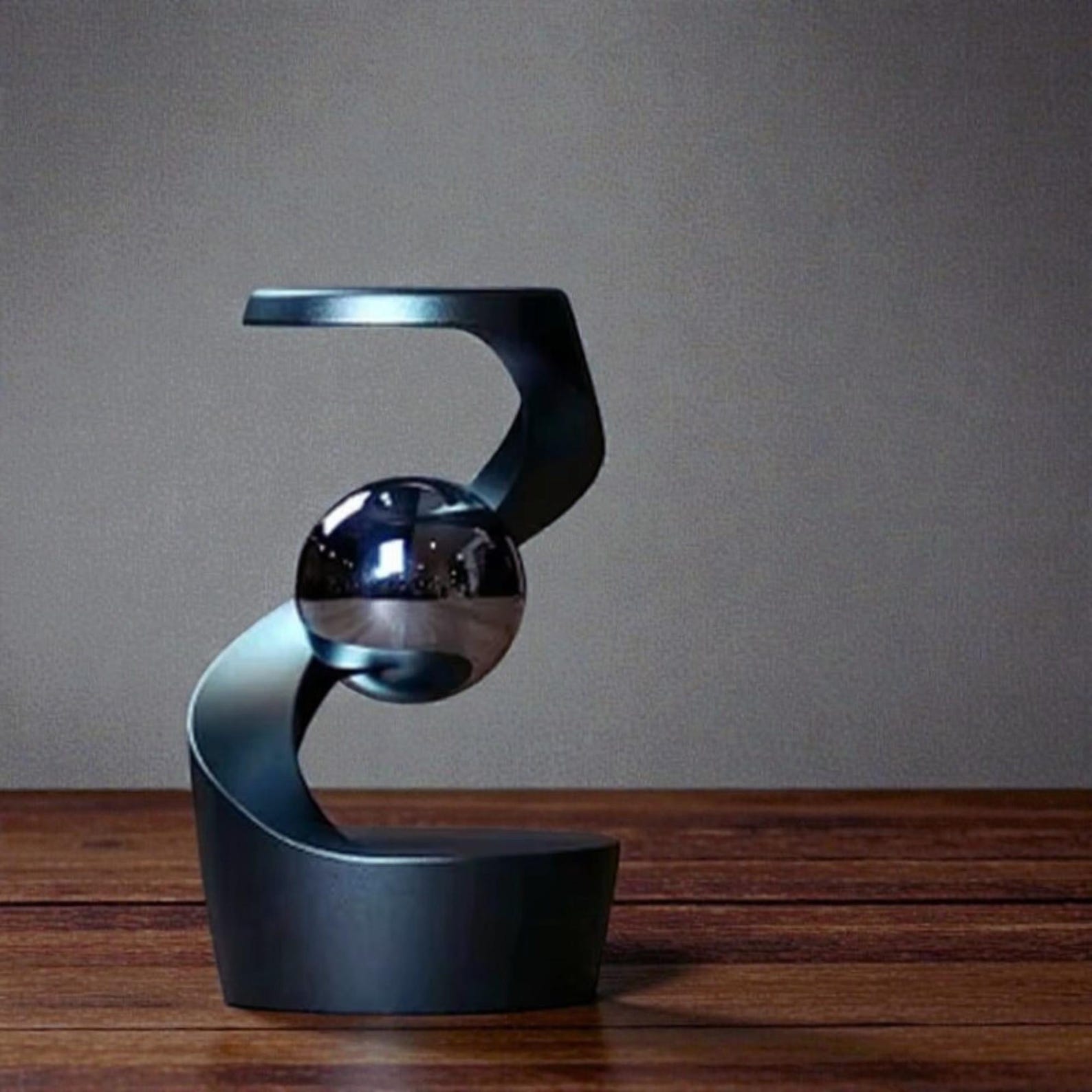 Image result for Floating Gyroscope Desk Decor Metal Gravity Defying Kinetic Sculpture ...