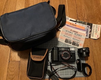 Canon Sure Shot / Autoboy with wide angle and telephoto lenses, adapter, case, manual