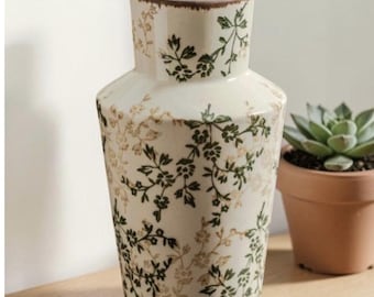 Jarrón de cerámica hecho a mano con forma de I y forma floral.