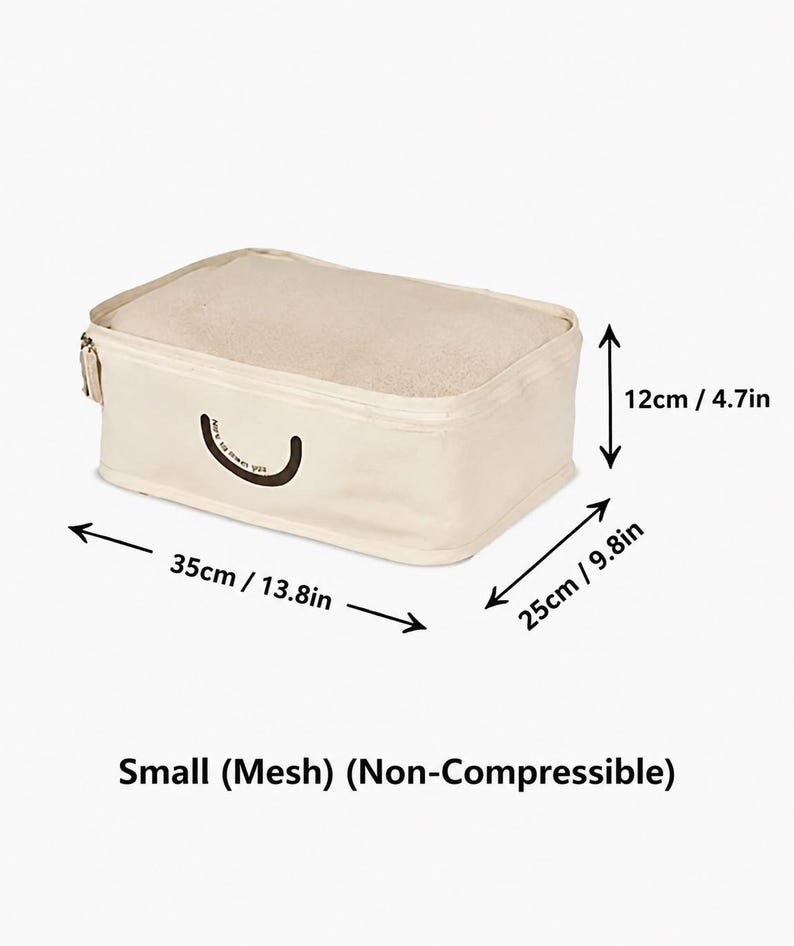 May include: A small, non-compressible beige packing cube with a mesh top and a zipper closure. The dimensions are 13.8 inches in length, 9.8 inches in width, and 4.7 inches in height. A small dark brown curved graphic is printed on the side.