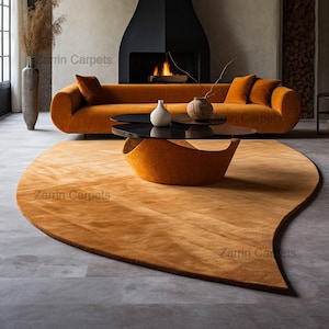 Handgetuft wollen vloerkleed: moderne mosterddruppel, amberkleurige abstracte vorm