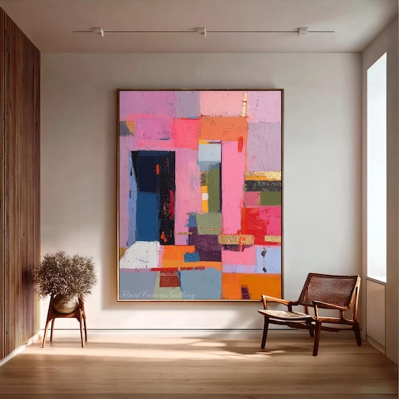 Large colorful geometric abstract painting, pink, orange, and navy blue palette knife art, gold accents modern living room wall decoration