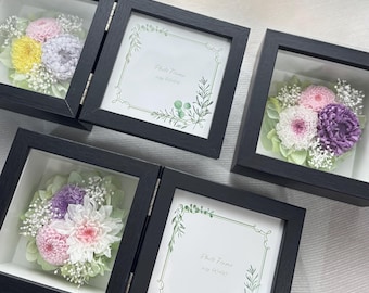 Bilderrahmen mit konservierten Blumen