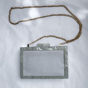 Pochette con perle ricamate a punto croce, finitura autolivellante