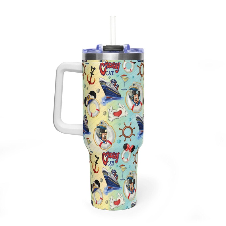 May include: A stainless steel tumbler with a handle and straw featuring a repeating pattern of cruise ships, life preservers, anchors, ship wheels, and cartoon characters. The text Castaway Cay is printed in red script against a light blue and yellow background.