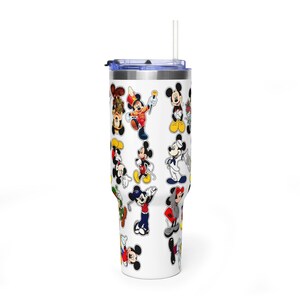 May include: A white stainless steel tumbler featuring a repeating pattern of various Mickey Mouse character illustrations in different outfits and poses. The drinkware includes a clear plastic lid and a matching clear straw inserted at the top.