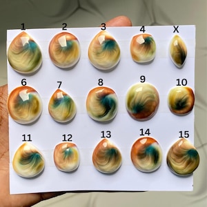 Shiva ögonskal cabochon naturlig snäckskal ädelsten för smyckestillverkning, lös operculum Shiva ögonskal sten för hänge ring