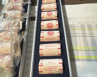 Uncirculated Gold President Dollars. 16 Rolls. Each roll has 10 dollars with a different president. Sold separately or will package