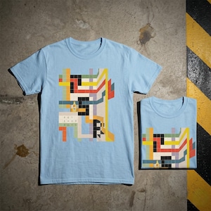 May include: A set of three ceramic mugs with a speckled, matte finish. The mugs are in shades of cream, light gray, and dark gray. Each mug has a simple, minimalist design, perfect for coffee or tea.