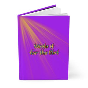 May include: A hardcover journal with a vibrant purple cover featuring a yellow sunburst effect emanating from the top left corner. The text "Write it for the Plot" is printed in the center in a multi-layered, colorful, retro-style font.