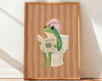 Póster decorativo de pared marrón estilo retro para baño con estampado de rana leyendo el periódico (descarga gratuita)