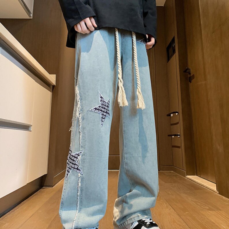 Wide Leg Jeans | Patchwork Graphic Denim Pants | Daily Wear | Y2K Streetwear Style

Wide leg denim jeans with embroidered y2k streetwear style