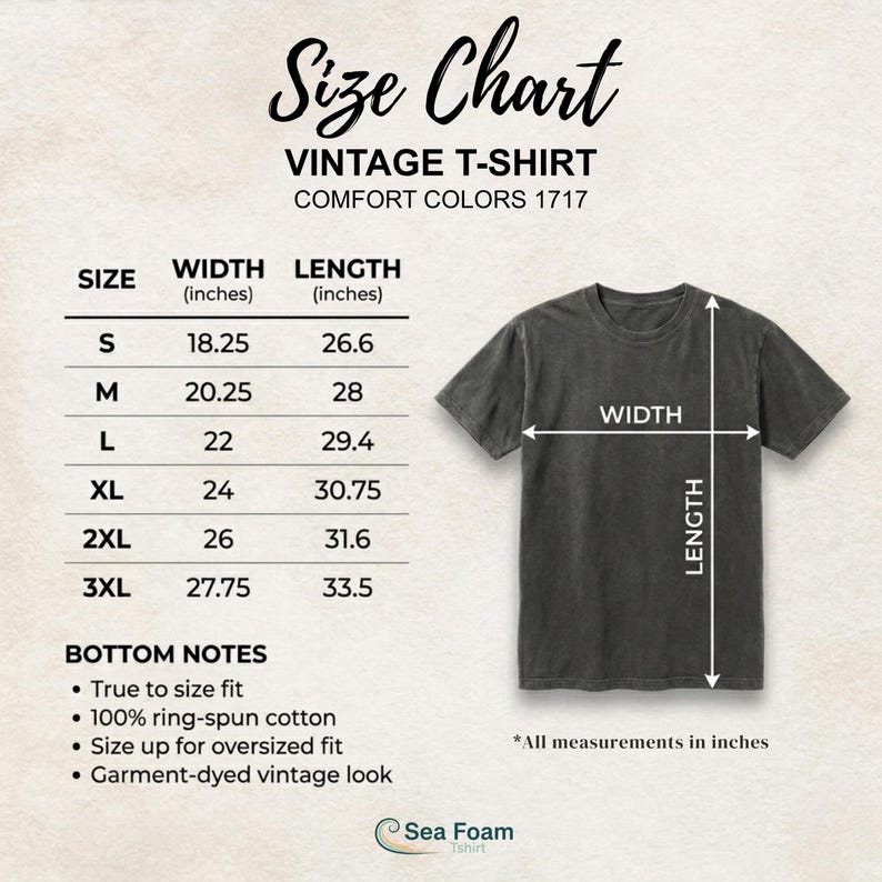 May include: A size chart for a vintage t-shirt, with measurements in inches. The chart includes sizes S to 3XL, with width and length dimensions. The shirt is a dark gray color, with the text "Sea Foam" at the bottom.