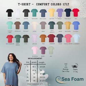 May include: A variety of Comfort Colors 1717 t-shirts in various colors, including black, white, and red. The image also displays a size chart with measurements in inches. The model is wearing a blue t-shirt.
