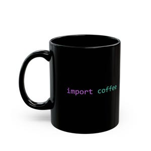 May include: Black ceramic coffee mug with the words "import coffee" in a gradient of purple and green. The mug has a curved handle and a glossy finish. The mug is designed for hot beverages.