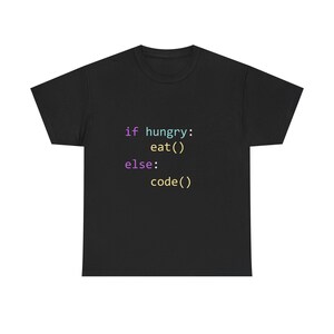 May include: Black t-shirt featuring the text "if hungry: eat() else: code()" in a programming code style. The text is in various colours. A casual garment for programmers and tech enthusiasts.