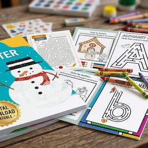 May include: A spiral-bound "Kids' Winter Activity Book" with a snowman illustration, alongside coloring pages and crayons. The book cover is teal with gold accents. Other pages include mazes and coloring activities.