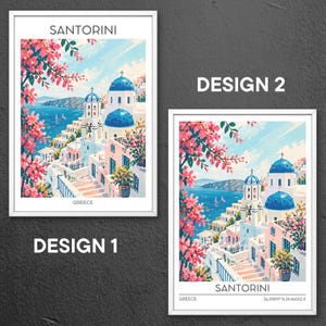 May include: Two framed art prints featuring a vibrant illustration of Santorini, Greece. The artwork showcases white buildings with blue domes, pink flowers, and the Aegean Sea. The prints are labeled "Design 1" and "Design 2".