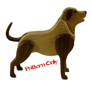May include: Wooden dog sculpture with a light brown body and dark brown legs and ears. The dog is standing with its head turned to the side. The text "Pattern Only" is printed in red on the bottom of the image.