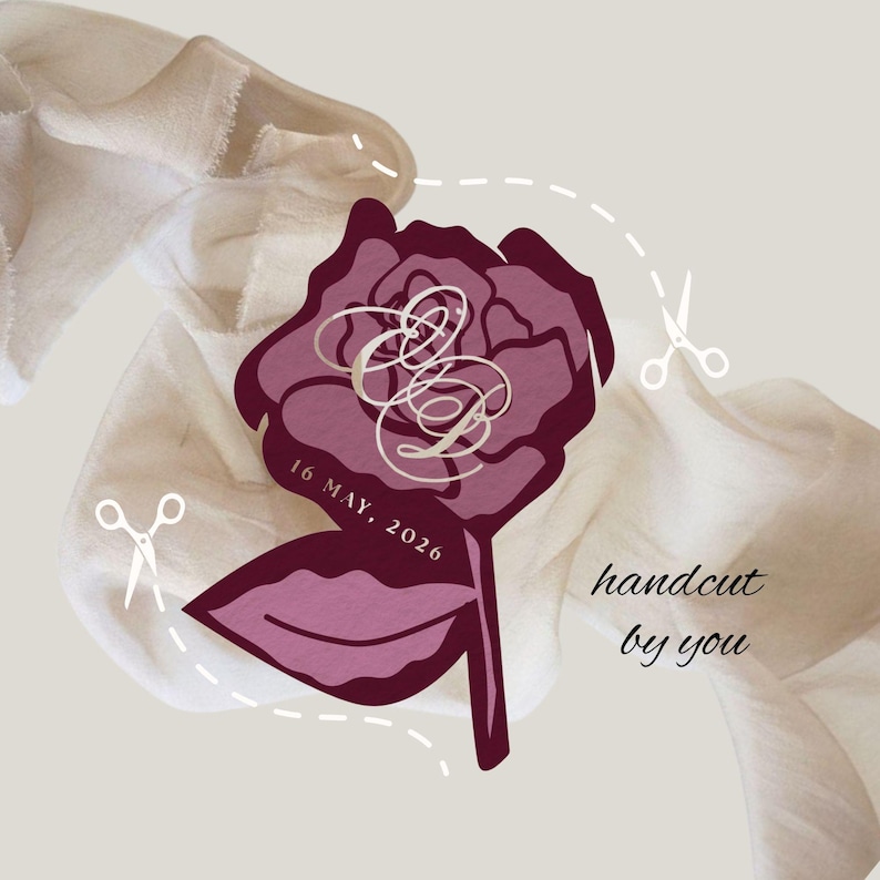 May include: A burgundy rose-shaped design with the text "16 MAY, 2026" and intertwined initials. The words "handcut by you" are also present. The design is set against a neutral background with fabric and scissors.