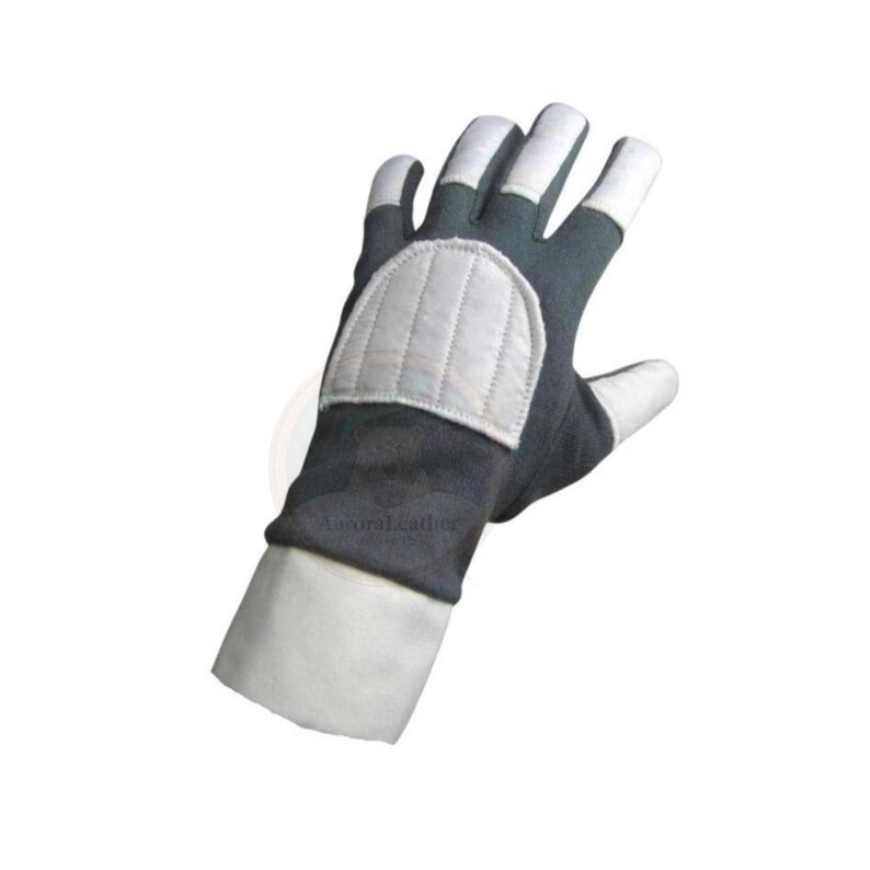 May include: A single black and white glove with a padded, quilted patch on the back of the hand. The fingertips and cuff are white, while the rest of the glove is black. The glove is designed for protection.