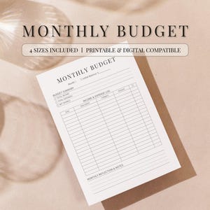Peut inclure: Un planificateur budgétaire mensuel blanc avec le titre "MONTHLY BUDGET" en police serif. Le planificateur comprend des sections pour les résumés budgétaires, les revenus, les dépenses et les notes. Le texte "4 SIZES INCLUDED | PRINTABLE & DIGITAL COMPATIBLE" est également visible.