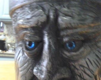 terra cotta/face planter 6-inch blue glass eyes