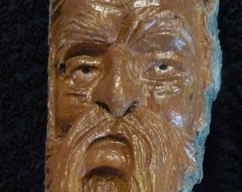 wood carving spirit wall hanging Pouty is this wood spirit name. Hand carved no power tools. wire hanger on back