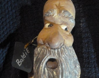 Baldie cotton wood carving