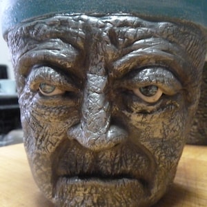 terra cotta 6-inch face planter hand sculpted