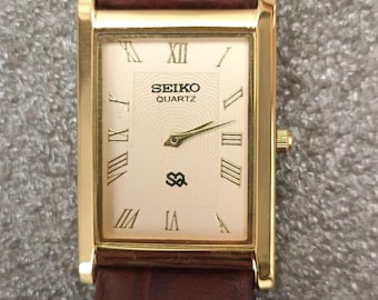 Vintage Seiko Slim Quartz Gold Dial Japan Made Stainless Steel Men's Wrist Watch