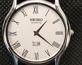 Vintage Seiko Slim Quartz White Dial Japan Made Stainless Steel Men's Wrist Watch