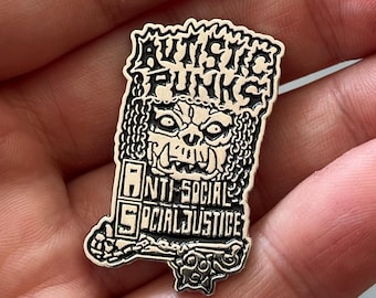 Spilla smaltata punk autistici