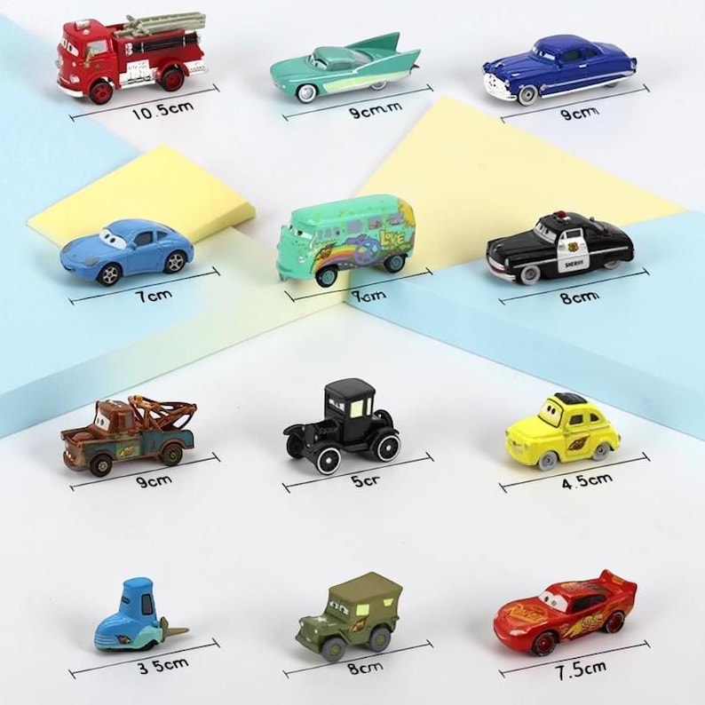 May include: A selection of toy cars in diverse colours, including red, blue, green, and yellow. The cars represent different styles, such as a fire engine, a police car, and a classic car. Measurements are in centimetres, with the largest car measuring 10.5cm.