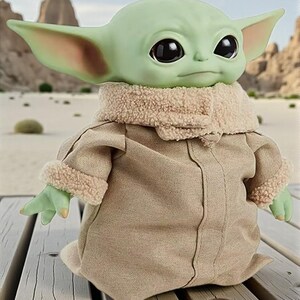May include: A green-skinned doll with large black eyes and pointed ears, wearing a tan coat with a fuzzy collar and cuffs. The doll is posed on a wooden surface, with a desert landscape in the background.