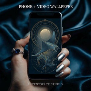 May include: A white ceramic mug with a black handle and the text "But First, Coffee" in a black, handwritten-style font. The mug is on a white surface.