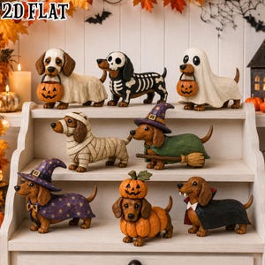May include: A collection of eight dachshund figurines dressed in Halloween costumes, including a ghost, skeleton, mummy, witch, and vampire. The figures are arranged on a white tiered shelf, with some holding small orange jack-o'-lantern buckets.