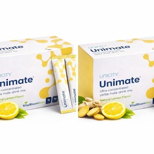 May include: Two boxes of Unimate yerba mate drink mix with natural lemon flavor. Each box is white with yellow accents and contains individual packets. Sliced lemons, ginger, and green leaves are arranged in front.