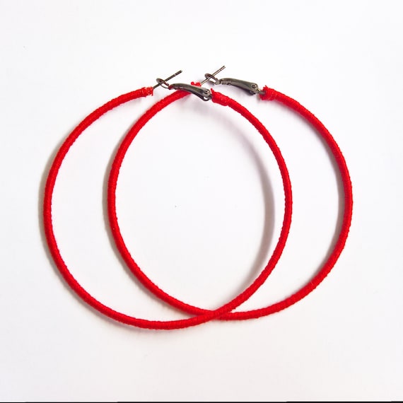 Red string best sale earrings