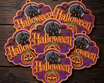May include: A collection of five embroidered Halloween ornaments featuring a central haunted house silhouette against a full moon, surrounded by purple filigree, orange pumpkins, and bats, with the word Halloween stitched in orange thread.