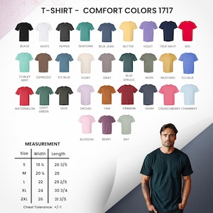 Peut inclure: Pr&eacute;sentation de t-shirts Comfort Colors 1717 dans diverses couleurs, dont le noir, le blanc et le rouge. L'image comprend &eacute;galement un tableau des tailles avec des mesures en centim&egrave;tres, et un homme portant un t-shirt vert fonc&eacute;.