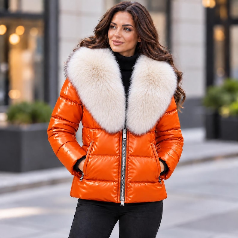 Women’s genuine leather puffer jacket with oversized faux fur collar, glossy quilted design, front zipper, and side zip pockets in multiple colors