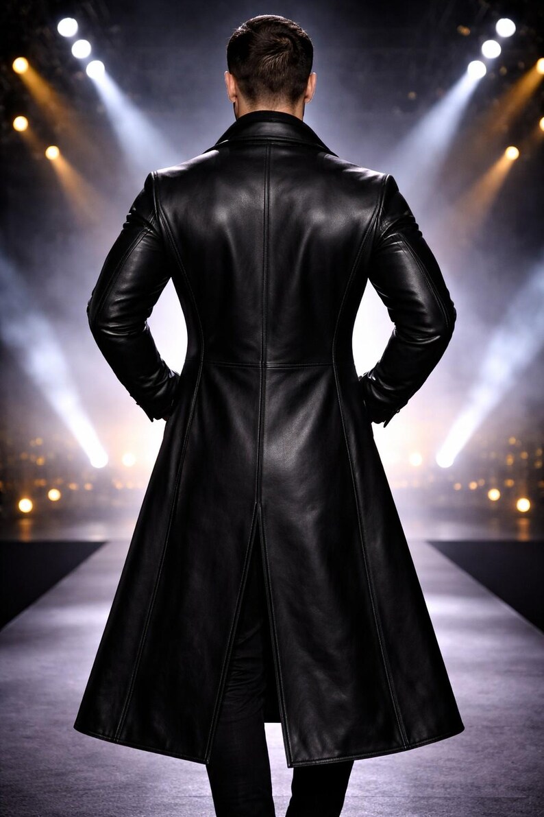 Man wearing a black leather trench coat with contrast trim in yellow, red, blue, purple, and white, matrix style long coat with futuristic gothic design, tailored fit, perfect for streetwear and winter fashion.