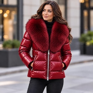 Women’s genuine leather puffer jacket with oversized faux fur collar, glossy quilted design, front zipper, and side zip pockets in multiple colors